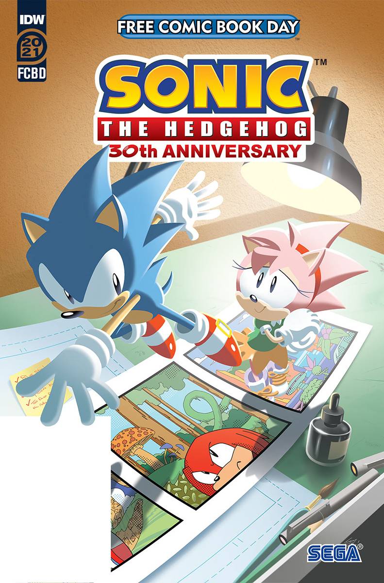 Sonic the Hedgehog 30th anniversary Free Comic Book Day cover - featuring Amy and Sonic above comic art supplies atop an artist's table